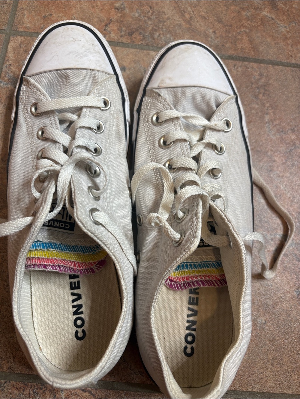 Converse Low Top Canvas Sneakers in Cream with Black Trim